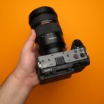 Free stock photo of camera with lens, cinematic camera, compact cinema camera